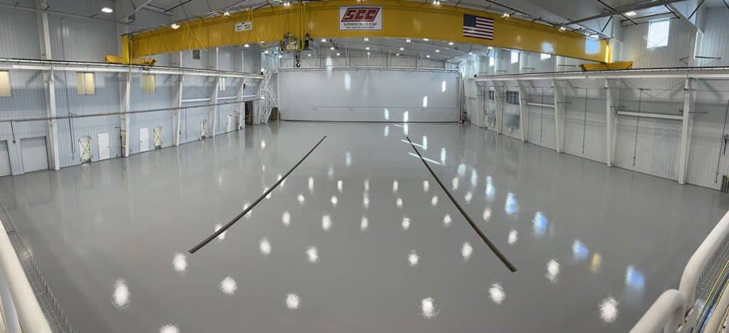 123 Resinous floor system applied to airplane hangar