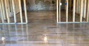 Rustic concrete wood installed on this old barn floor