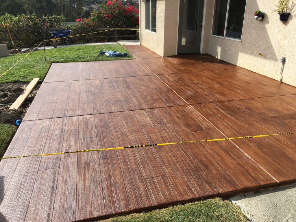 Concrete Wood Patio, a coating system offered by Big Dog Concrete Coatings in Stuart, IA