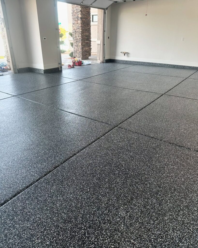 Example of a finished flake epoxy concrete floor coating in Phoenix, AZ