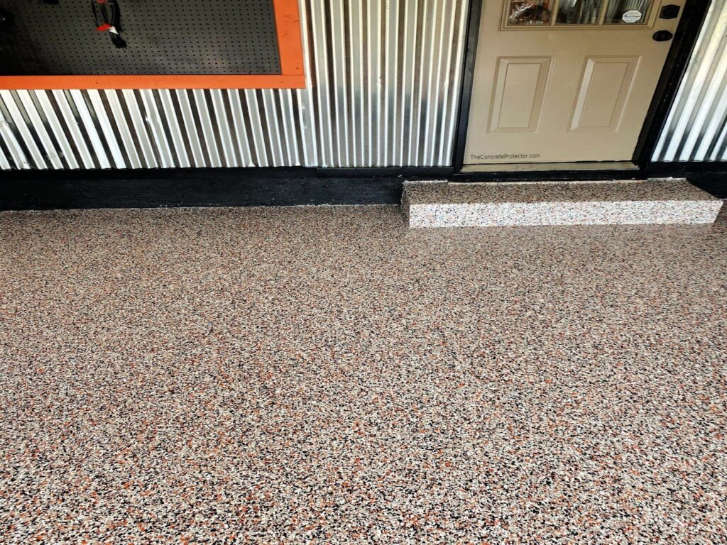 Example of a finished flake epoxy concrete floor coating in Clifton, IL
