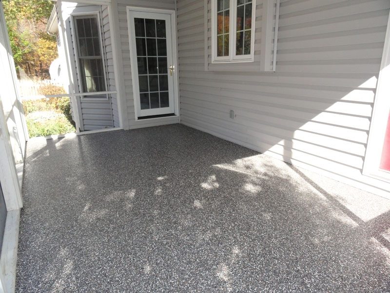Example of a finished flake epoxy concrete floor coating in El Paso, TX