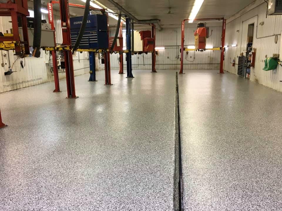 Example of a finished flake epoxy concrete floor coating in Valley Park, MO