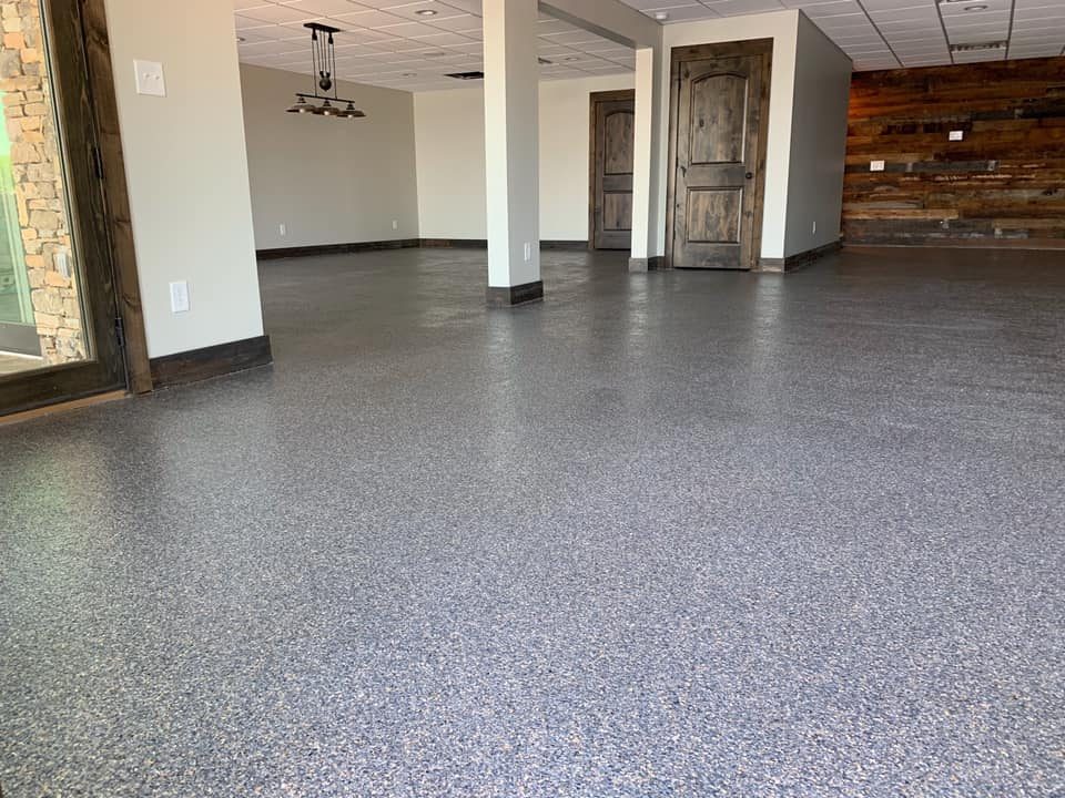Example of a finished flake epoxy concrete floor coating in Carroll, OH