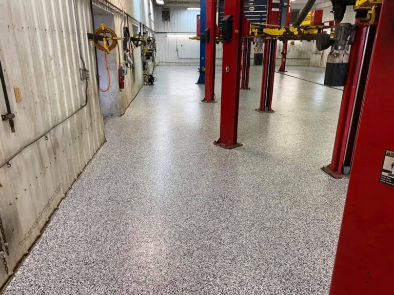 Example of a finished flake epoxy concrete floor coating in St. George, UT – Ayalas Concrete Designs, LLC