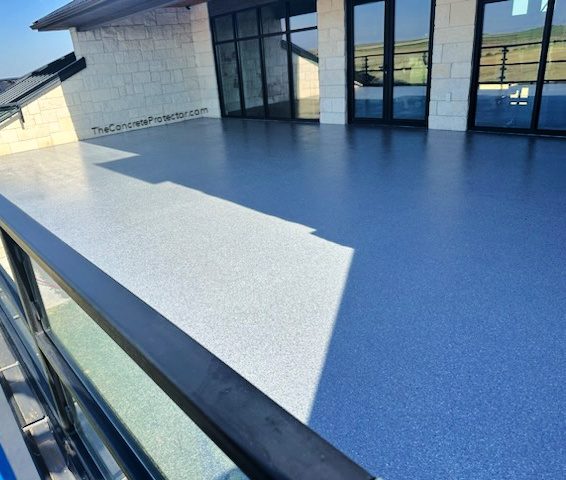 Example of a finished flake epoxy concrete floor coating in New Bedford, MA – Atlas Epoxy Flooring