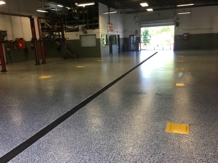 Example of a finished flake epoxy concrete floor coating in Frankfort, KY – Frankfort Concrete Contractors