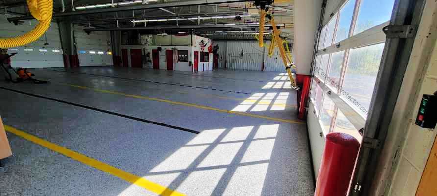 Example of a finished flake epoxy concrete floor coating in Milton, MA