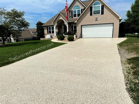 Example of a finished flake epoxy concrete floor coating in Lubbock, TX – Flatland Concrete Coating
