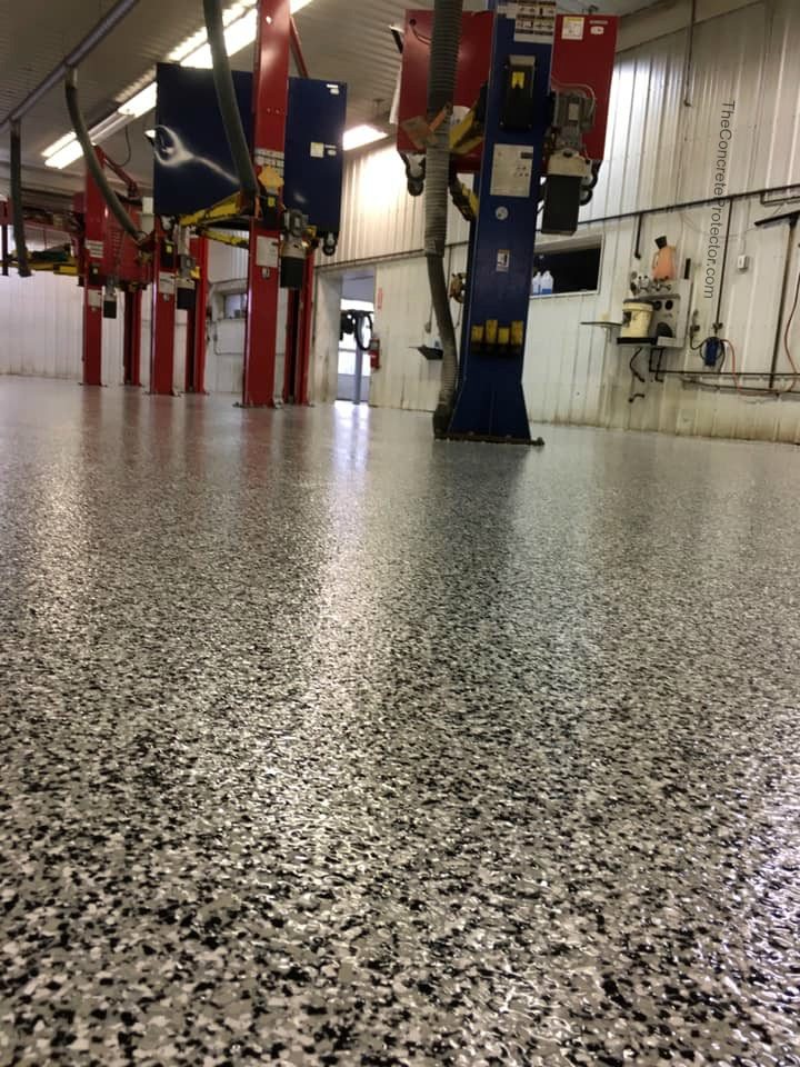 Example of a finished flake epoxy concrete floor coating in Euless, TX – XPS Xpress Metroplex