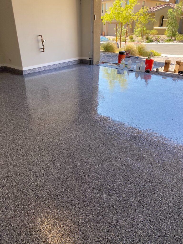 Example of a finished flake epoxy concrete floor coating in Orlando, FL – Advanced Coating Technologies