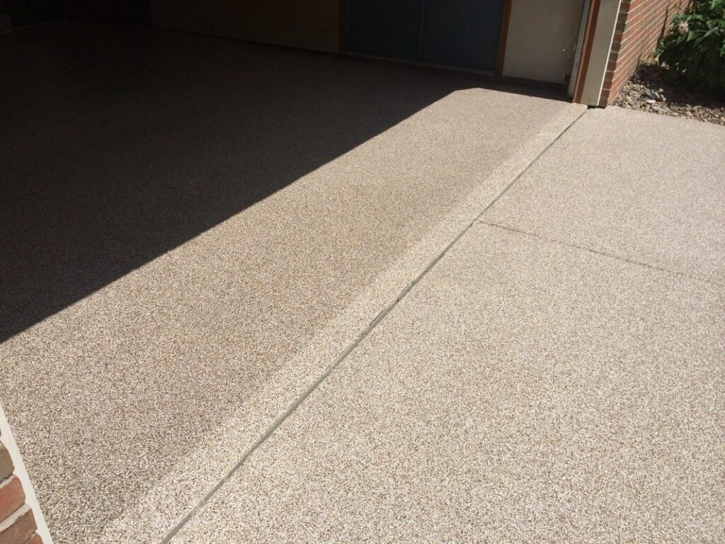 Example of a finished flake epoxy concrete floor coating in Greenville, SC