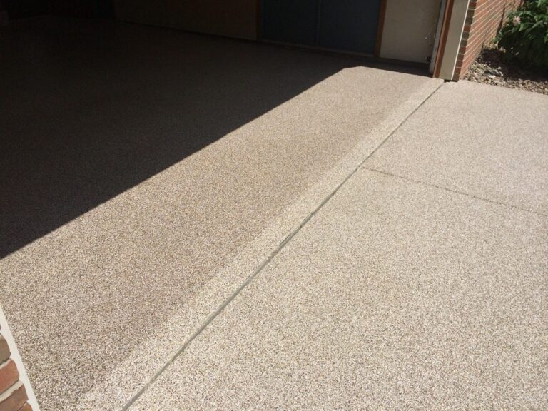 Example of a finished flake epoxy concrete floor coating in College Station, TX – Aggieland Concrete