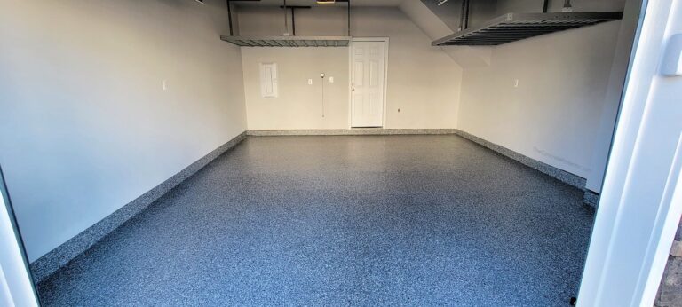 Example of a finished flake epoxy concrete floor coating in Hot Springs, AR – A & P Concrete Construction