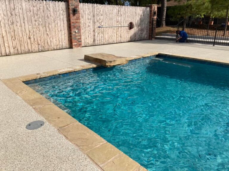 Example of a finished flake epoxy concrete floor coating in Houston, TX – One Awesome Concrete