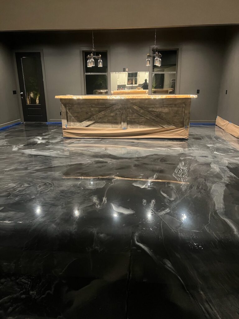 Example of a finished metallic epoxy floor in Fort Collins, CO – Alejandro’s Decorative Concrete, LLC