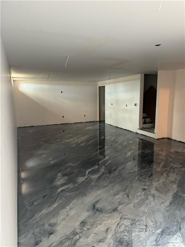 Example of a finished metallic epoxy floor, Dracut, MA