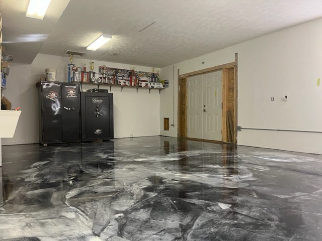 Example of a finished metallic epoxy floor in Phoenix, AZ – Slide-Lok Garage Interiors