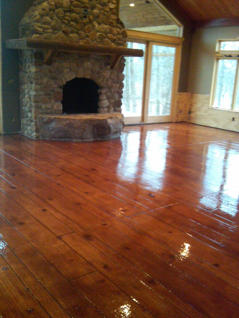 Example of a finished wood-look decorative concrete floor in Fort Wayne, IN