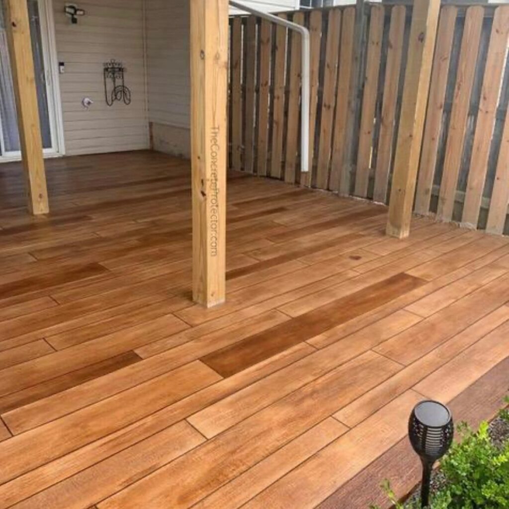 Example of a finished wood-look decorative concrete floor in Cypress, TX