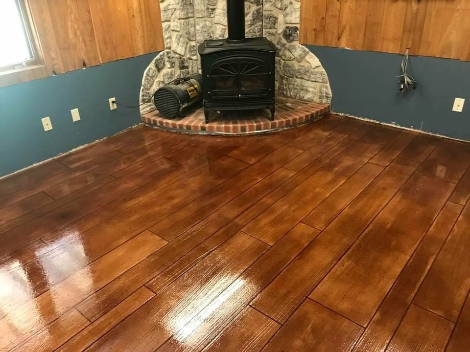 Example of a finished wood-look decorative concrete floor in Albany, NY