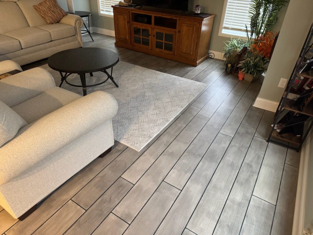 Example of a finished wood-look decorative concrete floor in Garland, TX