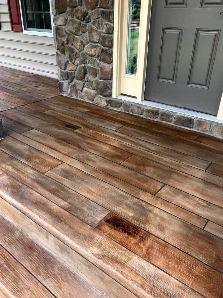 Example of a finished wood-look decorative concrete floor in De Pere, WI