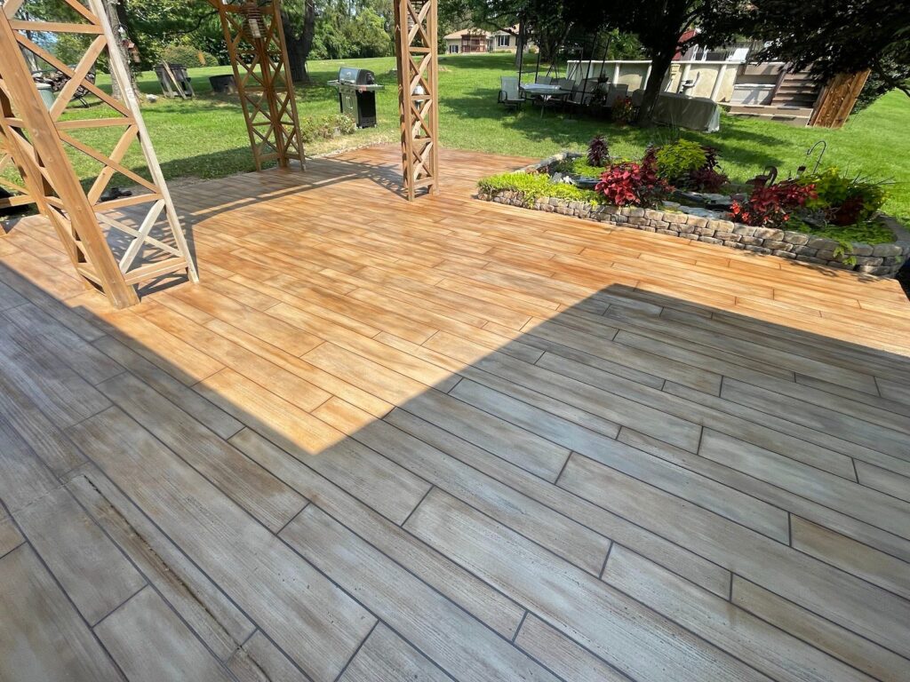 Example of a finished wood-look decorative concrete floor in Fairport, NY