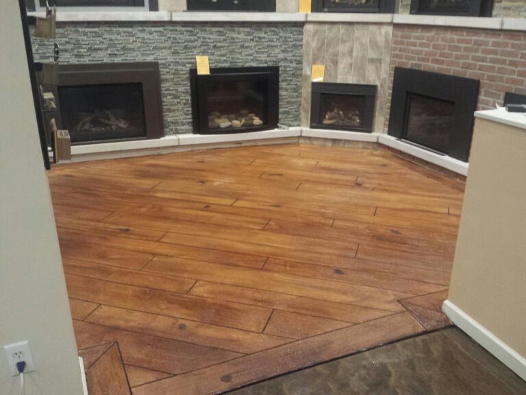 Example of a finished wood-look decorative concrete floor in Grand Rapids, MI – Basement Flooring Masters