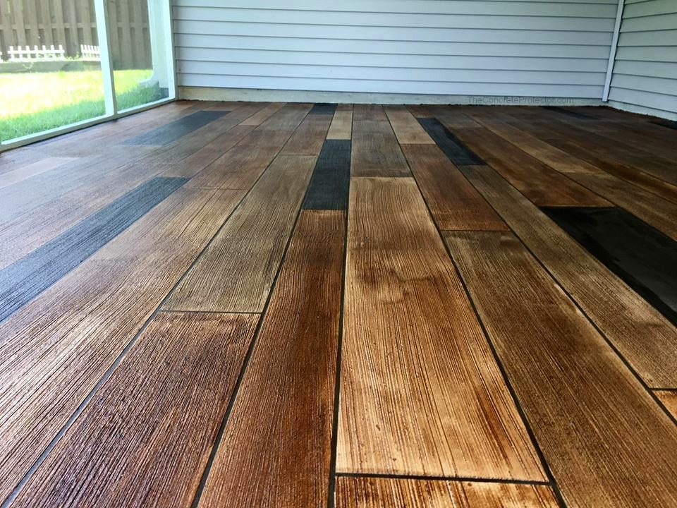 Example of a finished wood-look decorative concrete floor in Kennesaw, GA