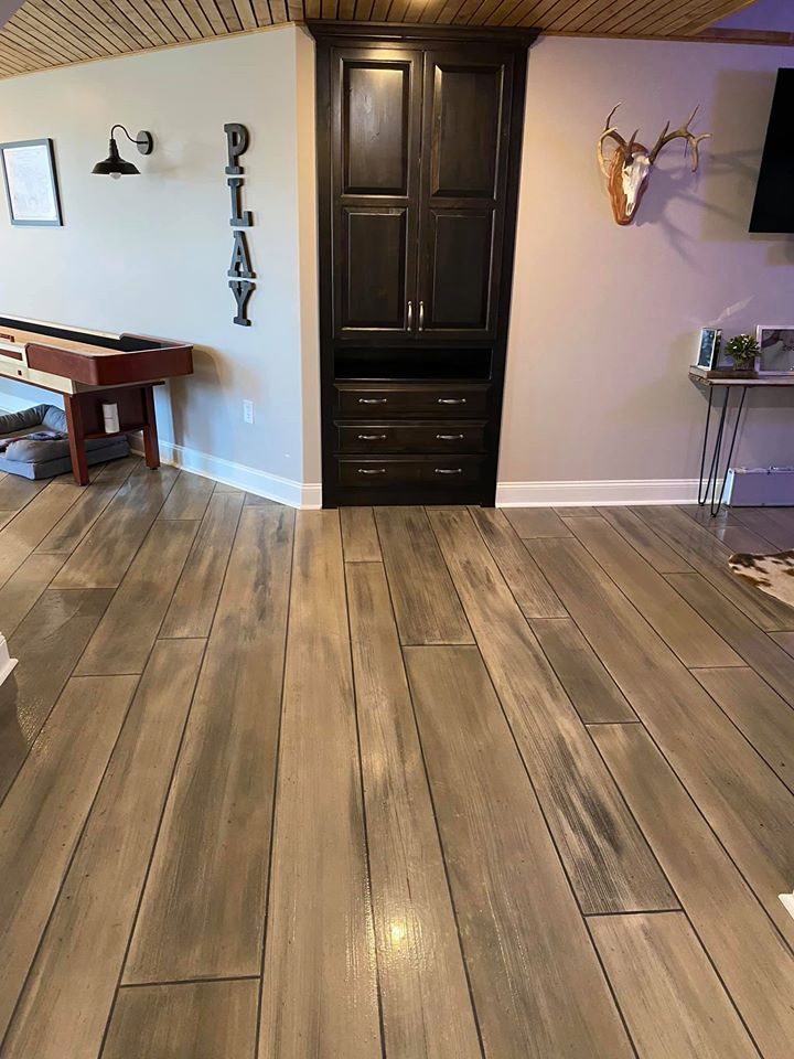 Example of a finished wood-look decorative concrete floor in San Antonio, TX – ResinTex