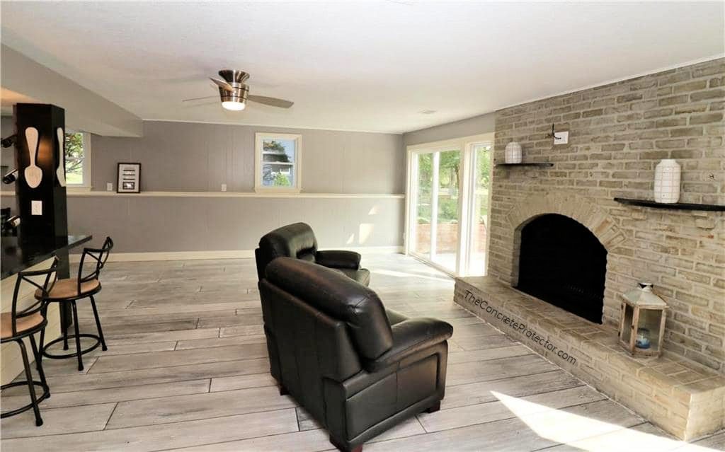 Example of a finished wood-look decorative concrete floor in Pearland, TX