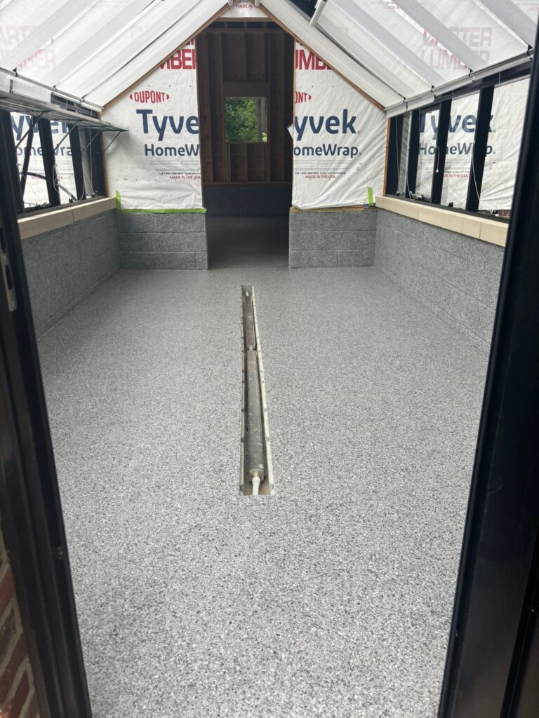 Fresh epoxy floor installation by Floorific Creations LLC in Southington, OH
