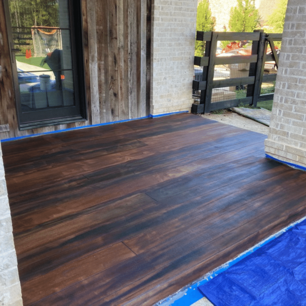 Rustic concrete wood patio by Reeves Concrete Solutions in Roswell, GA