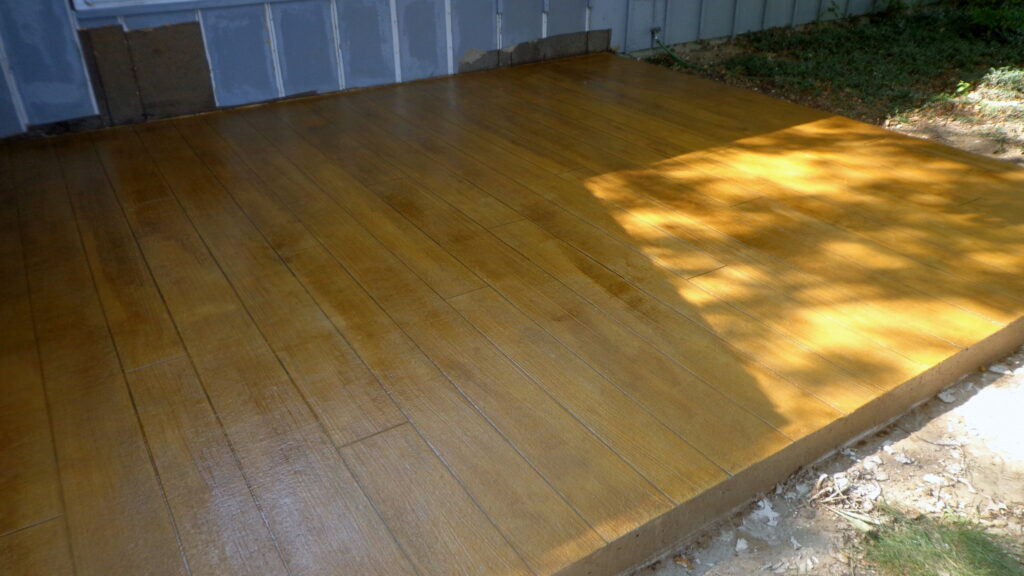 Concrete Wood Patio, a coating system offered by Sure Coat Epoxy in Brinson, GA