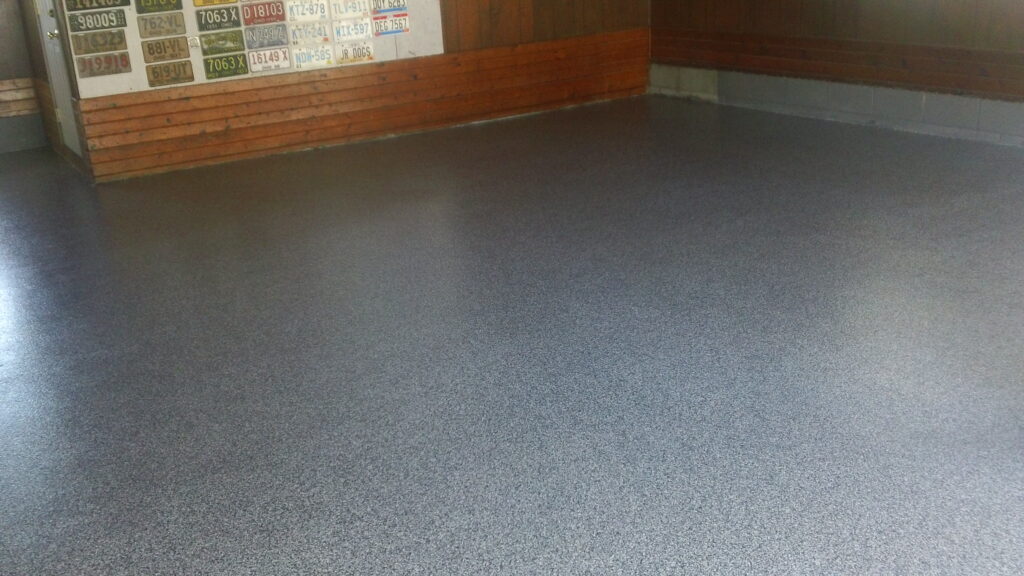 Epoxy Flake Garage Floor, a coating system offered by Sure Coat Epoxy in Brinson, GA